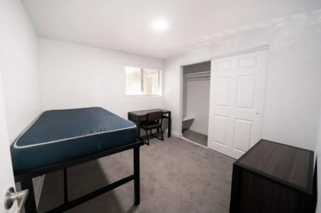 Bed desk closet and cabinet bedroom at Glenwood Apartments in Provo Student Accommodation