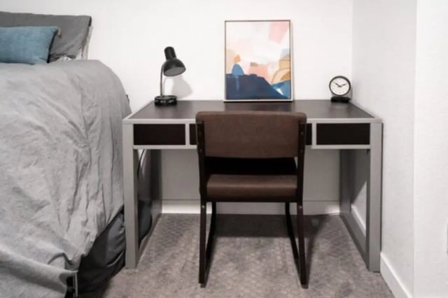 Bed desk lamp clock abstract art bedroom at Glenwood Apartments in Provo Student Accommodation