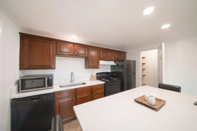 Kitchen with cabinets appliances microwave and sink kitchen at Glenwood Apartments in Provo Student Accommodation