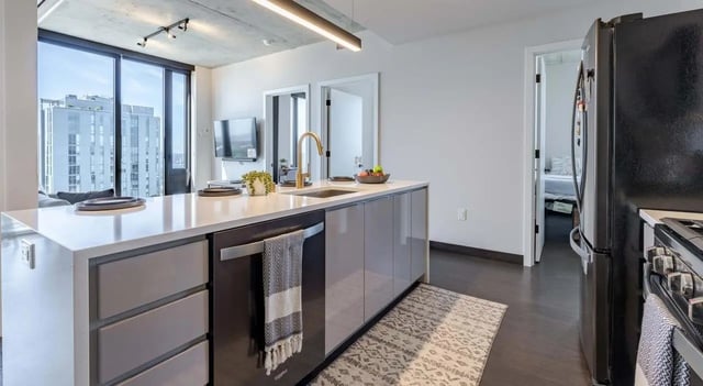 Kitchen with island counter and refrigerator Kitchen at The M Seattle in Seattle Student Accommodation