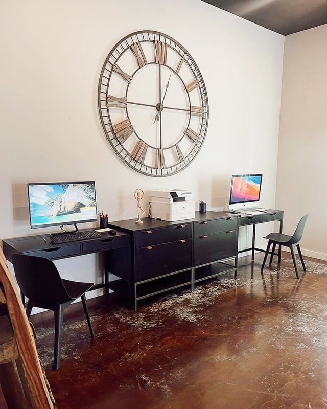 Two desks computers printer and clock study area at Fireside District Apartments in Stephenville Student Accommodation