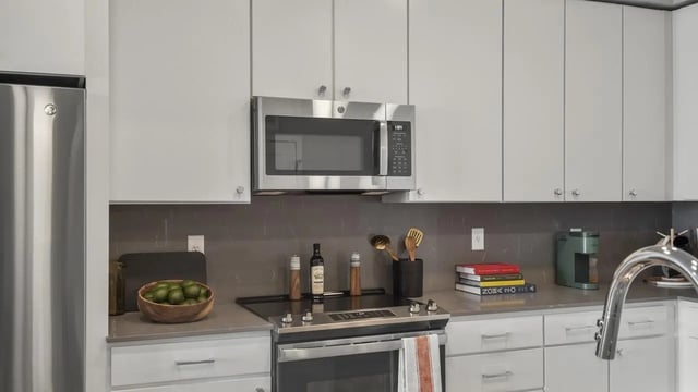 Stainless steel appliances microwave stove coffee maker kitchen at The Dorsey in Denver Student Accommodation