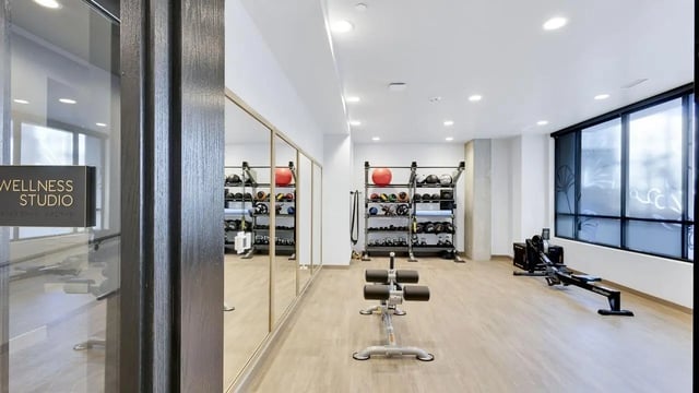 Weights benches and rowing machine gym fitness studio at The Dorsey in Denver Student Accommodation