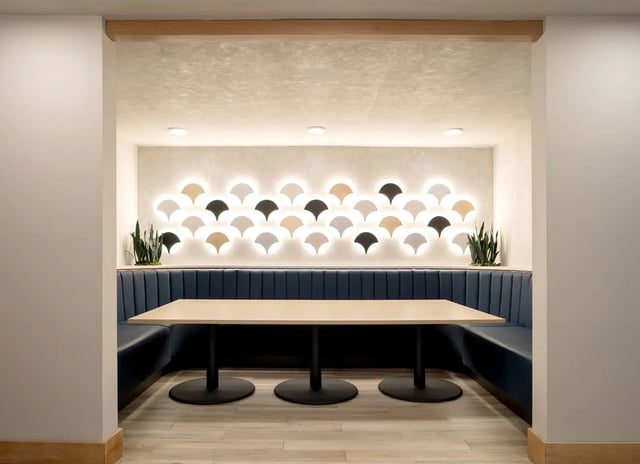 Booth seating with table and decorative wall living room at Dockside Clemson in Clemson Student Accommodation