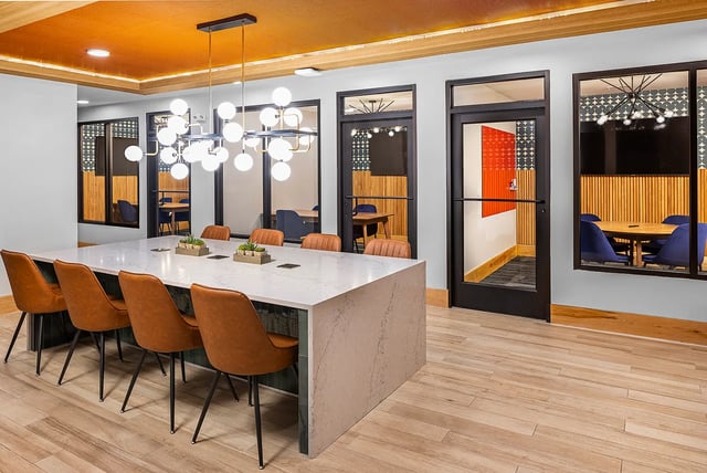 Modern communal space with large table study areas at Dockside Clemson in Clemson Student Accommodation