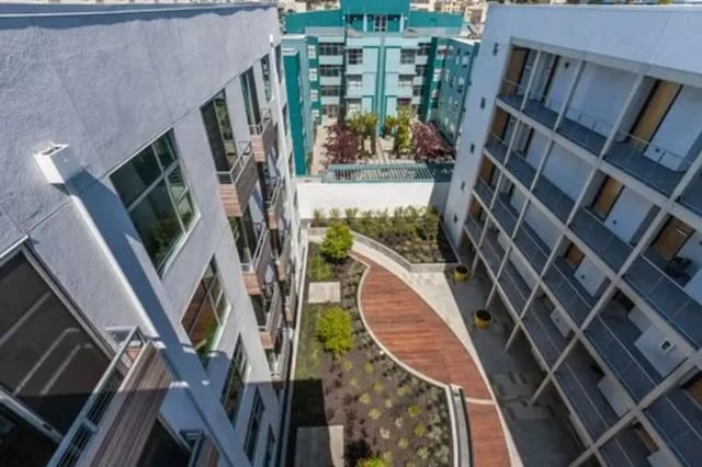 Courtyard with balconies buildings and landscaping exterior at The Dwight by Arthaus in Berkeley Student Accommodation
