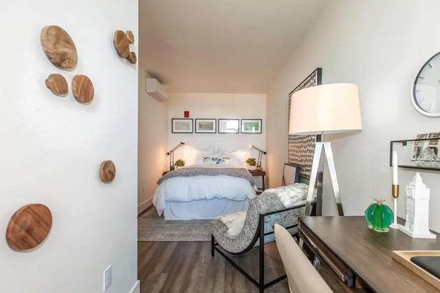 White bed desk chair wall decor bedroom living room at The Dwight by Arthaus in Berkeley Student Accommodation