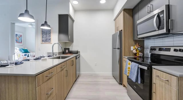 Modern kitchen with island and appliances kitchen at Union Grantville in San Diego Student Accommodation