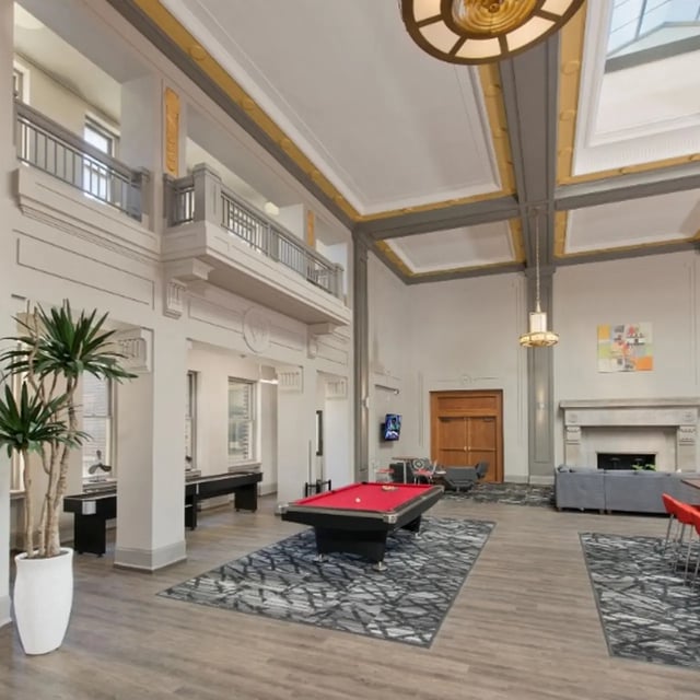 Billiard table shuffleboard tables lounge area living room at Domain at Cleveland in Cleveland Student Accommodation