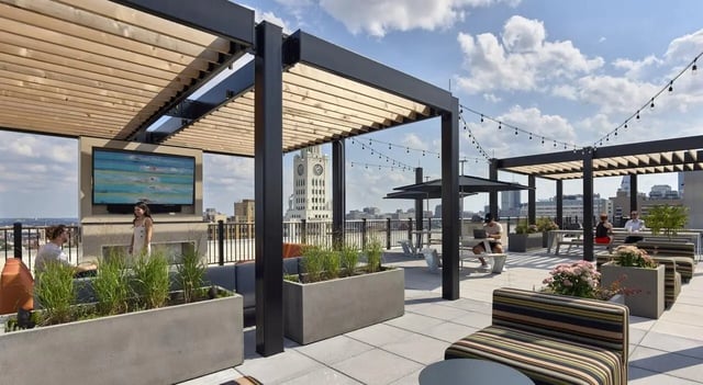 Rooftop lounge area with TV and seating patio at The Hamilton in Philadelphia Student Accommodation