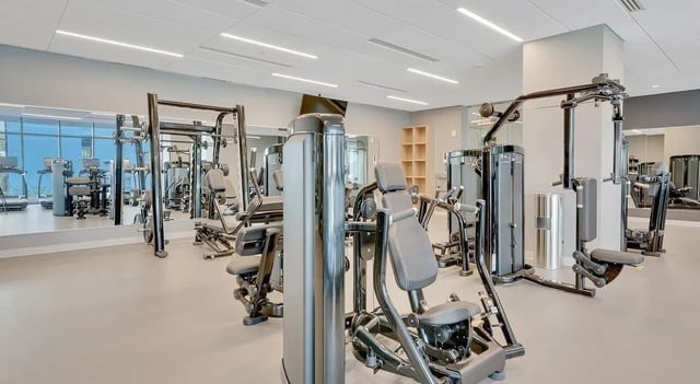 Weight machines and treadmills in modern gym. at The Chestnut in Philadelphia Student Accommodation
