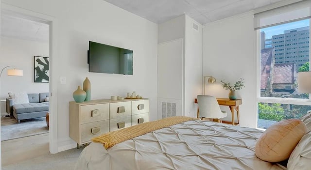 Bed desk TV dresser with vases Bedroom at The Chestnut in Philadelphia Student Accommodation