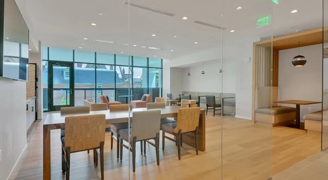 Dining table chairs and booths common area at The Chestnut in Philadelphia Student Accommodation