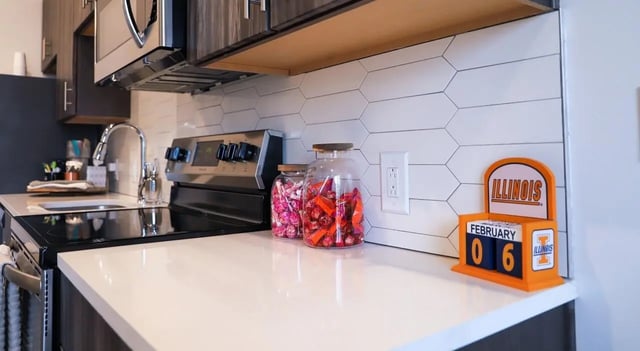 Candy jars and Illinois calendar kitchen at Legacy202 Apartments in Champaign Student Accommodation