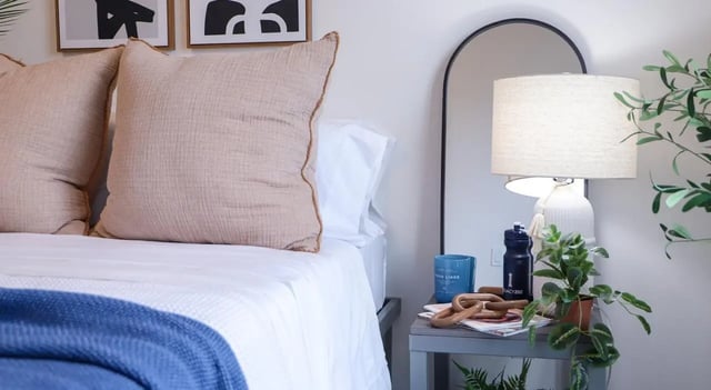 Two pillows on a bed with blue throw bedroom at Legacy202 Apartments in Champaign Student Accommodation