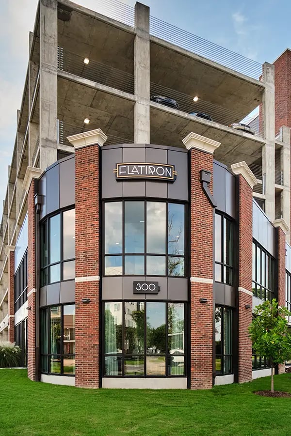 Flatiron building with parking garage exterior at Flatiron in Baton Rouge Student Accommodation