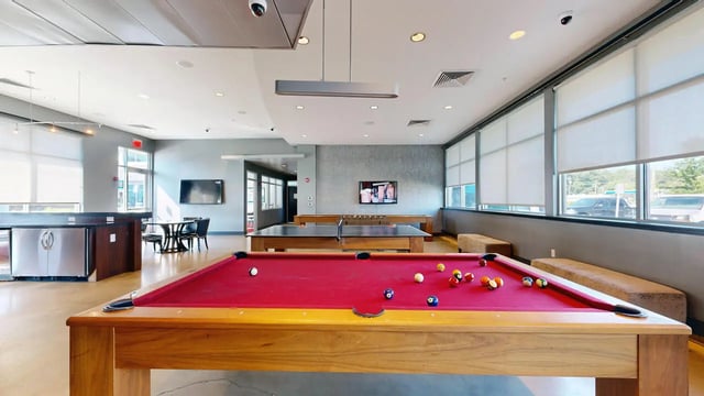 Pool table ping pong table foosball table lounge area at Magnolia, A Prosper Community in Tuscaloosa Student Accommodation