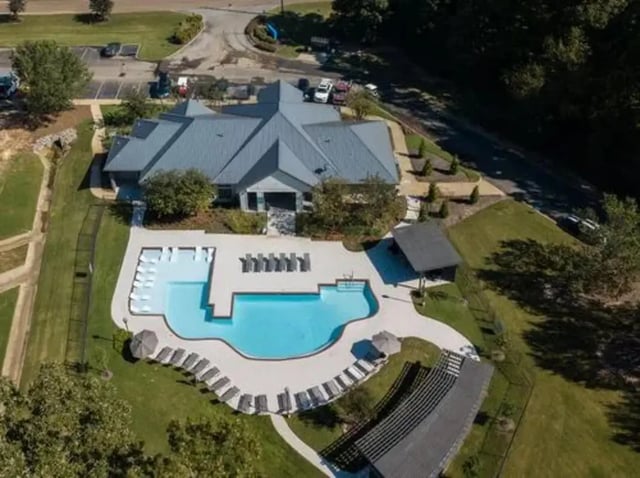 Resort-style pool with lounge chairs exterior at Flatts at South Campus in Oxford Student Accommodation