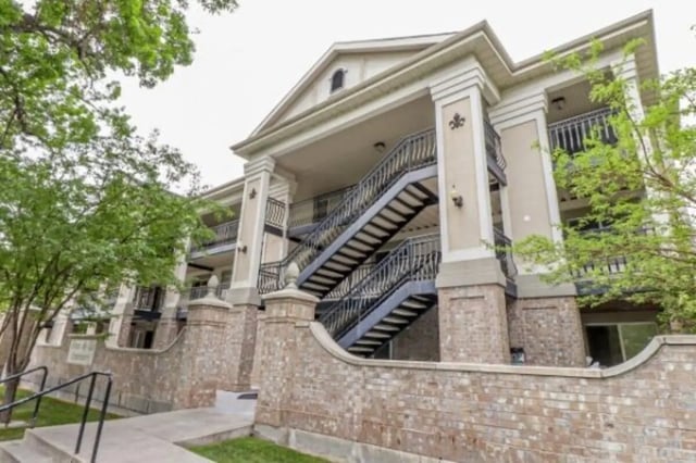 Exterior stairs and balconies on apartment building exterior at Fleur De Lis Apartments in Provo Student Accommodation