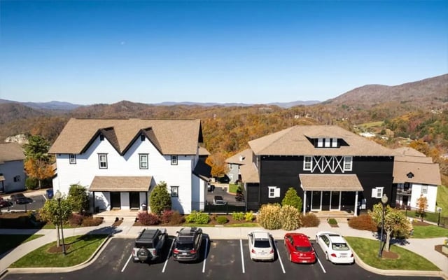 Student housing buildings with parking lot exterior at Highpointe in Boone Student Accommodation
