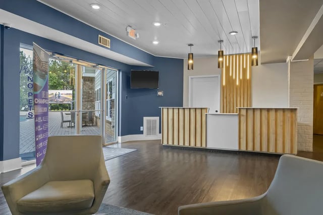 Lobby with reception desks and seating area lobby at The Ridge Clemson in Central Student Accommodation