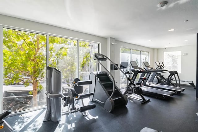 Gym equipment treadmills stair climber stationary bike gym at Pointe San Marcos in San Marcos Student Accommodation