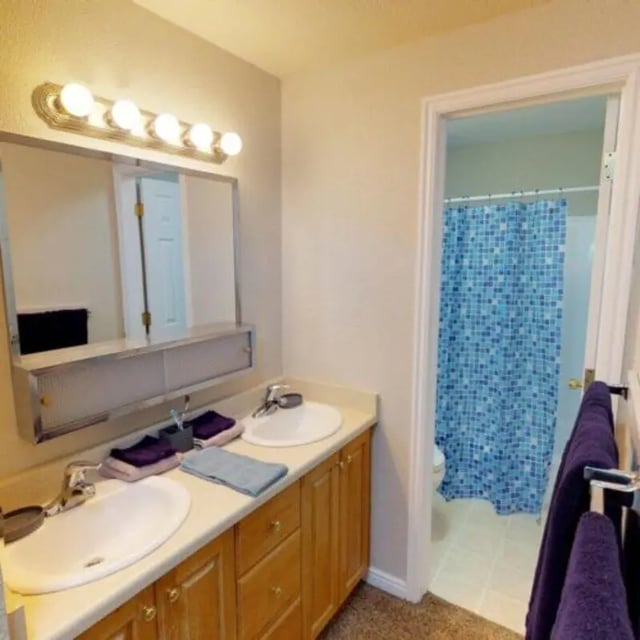 Double vanity mirror and towels then bathroom at The Pines in Rexburg Student Accommodation