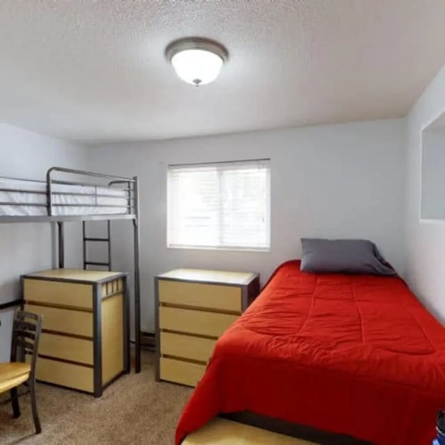 Bunk bed dresser bed window bedroom at The Pines in Rexburg Student Accommodation