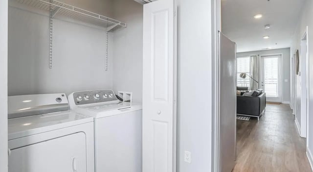 Washer dryer with shelving laundry room at Lancaster Apartments in Champaign Student Accommodation