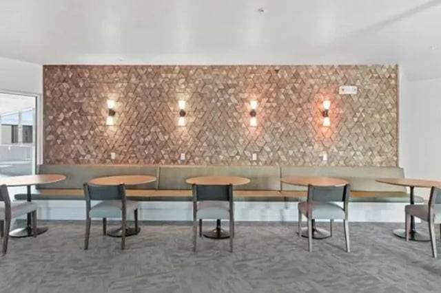 Booth seating with tables and chairs study area at Summit SLO in San Luis Obispo Student Accommodation