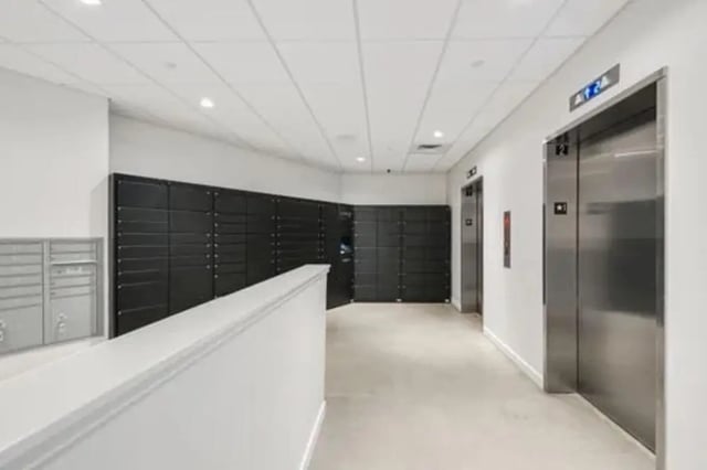 Mailboxes lockers elevators and hallway exterior at Summit SLO in San Luis Obispo Student Accommodation