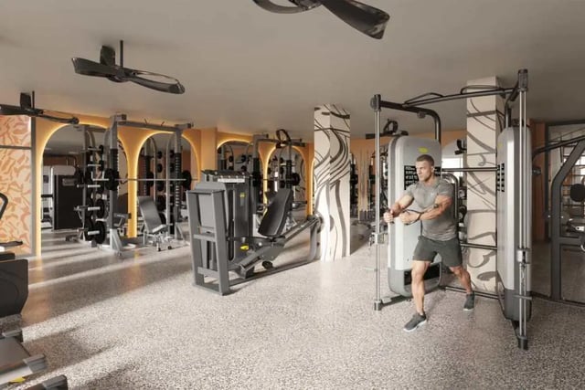 Man exercising on cable machine gym equipment gym at Mazza GrandMarc in College Park Student Accommodation