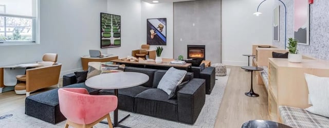 Comfortable seating with fireplace and study areas Living room at Landmark Apartments in Ann Arbor Student Accommodation