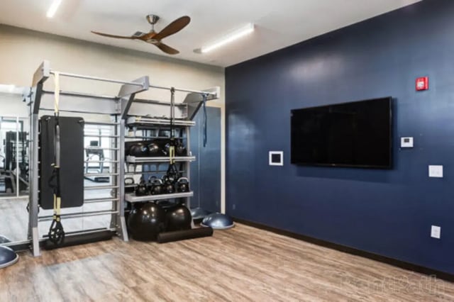 Fitness equipment weights and television gym at Stadium View in Ames Student Accommodation
