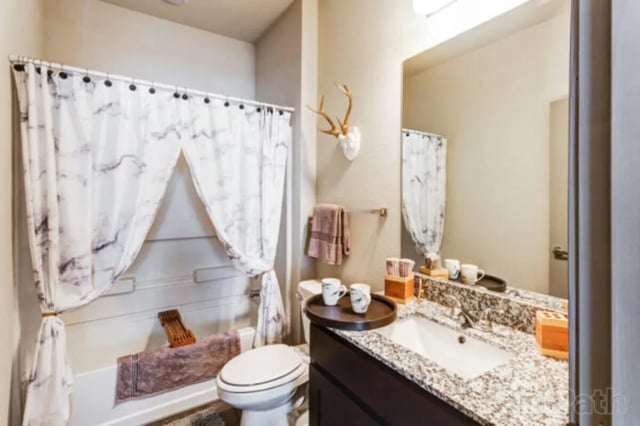 Marble shower curtain toilet sink bathroom at Stadium View in Ames Student Accommodation
