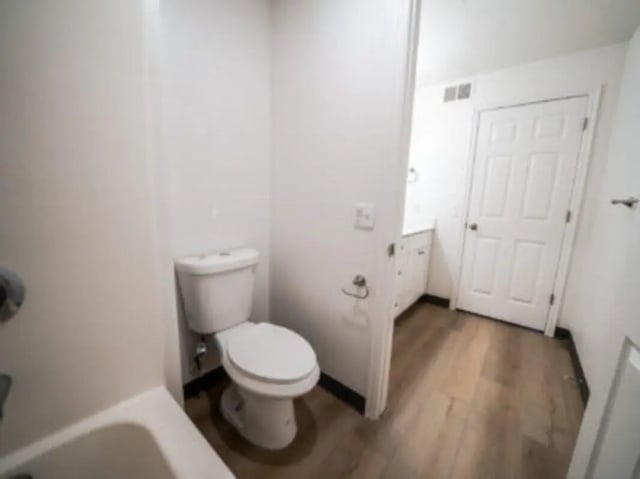 White toilet bathtub and white door bathroom at Village on the Parkway in Orem Student Accommodation