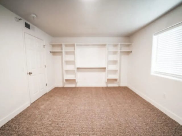 Empty room with shelves and door bedroom at Village on the Parkway in Orem Student Accommodation