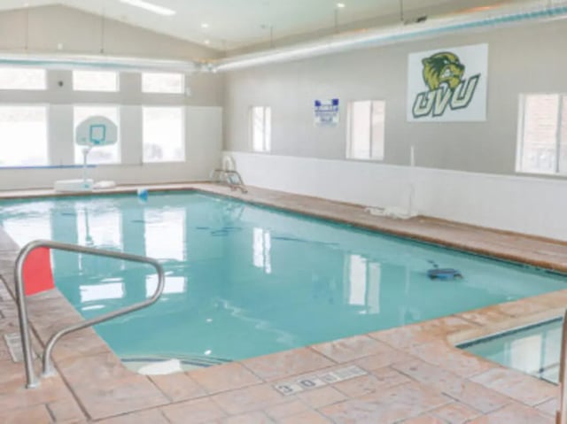 Indoor swimming pool with basketball hoop and diving toy pool at Village on the Parkway in Orem Student Accommodation