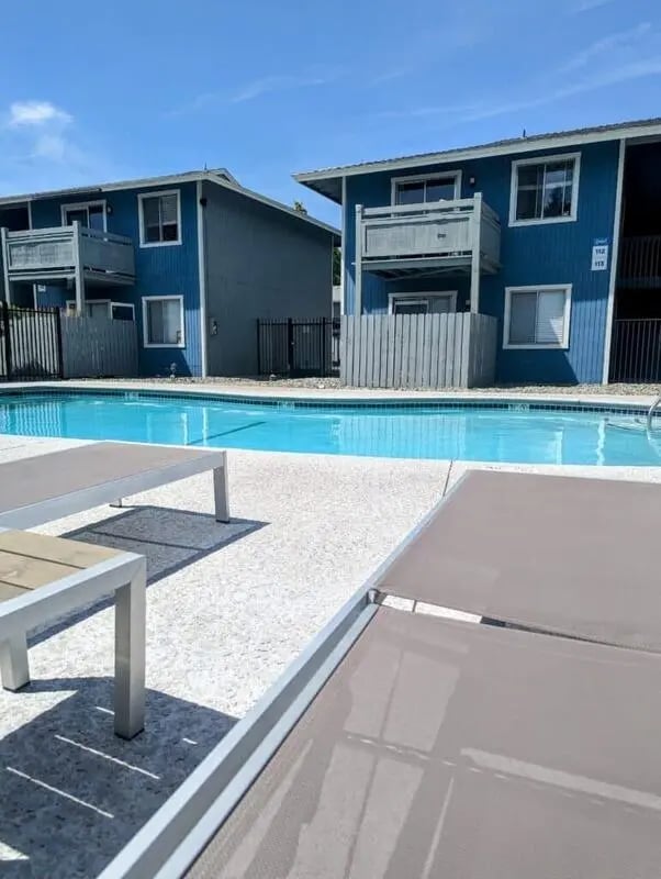 Pool and apartment buildings exterior at Wildcat Crossing in Chico Student Accommodation