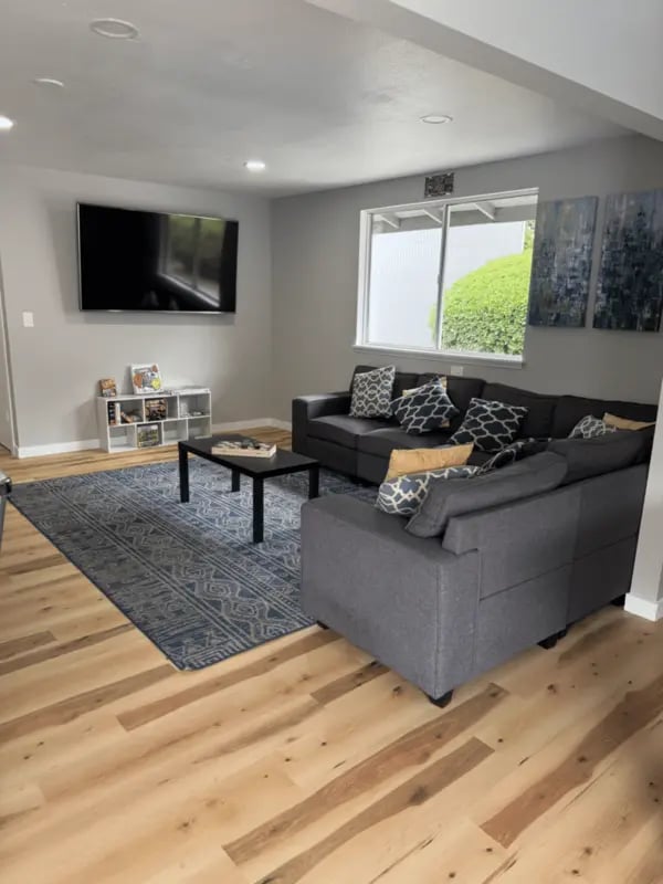 Sofa rug television and coffee table living room at Wildcat Crossing in Chico Student Accommodation