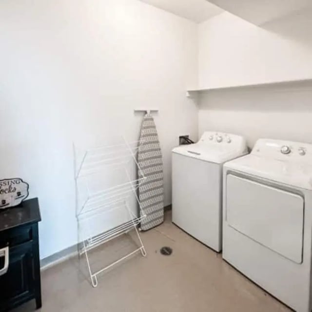 Dry rack ironing board washing machines laundry room at Promenade Place in Orem Student Accommodation