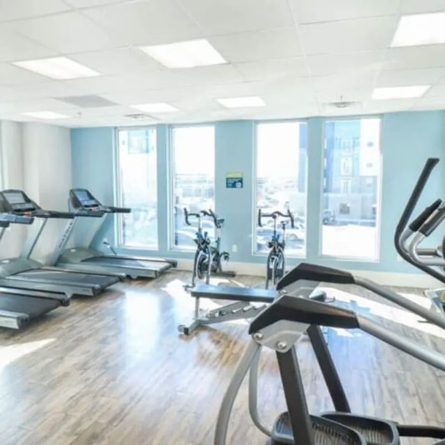 Treadmills exercise bikes elliptical gym facility at Promenade Place in Orem Student Accommodation