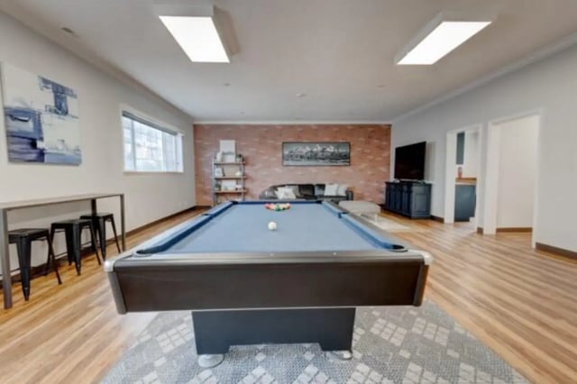 Pool table with balls and couch lounge area. at The Colonial House in Rexburg Student Accommodation