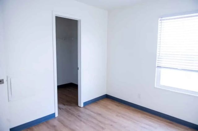 Empty room with closet and window bedroom at Silvertree Communities in Muncie Student Accommodation