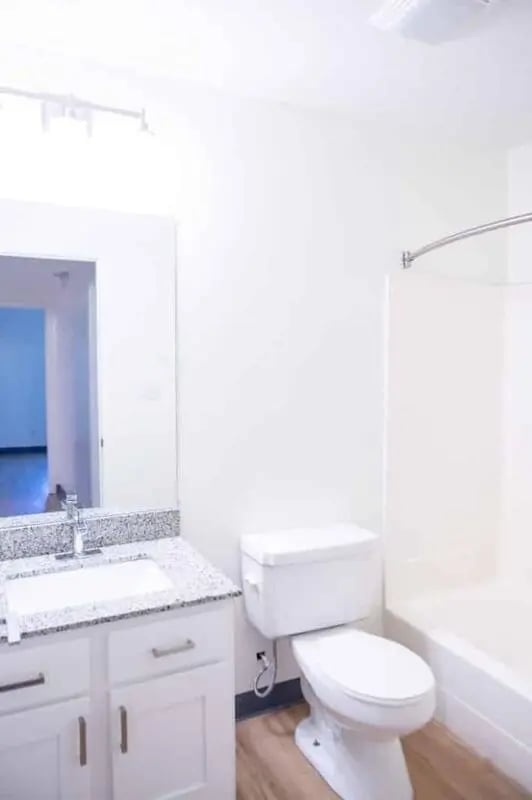 Sink toilet bathtub vanity mirror bathroom at Silvertree Communities in Muncie Student Accommodation