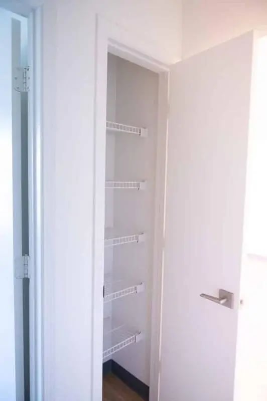White wire shelves in a closet storage area at Silvertree Communities in Muncie Student Accommodation