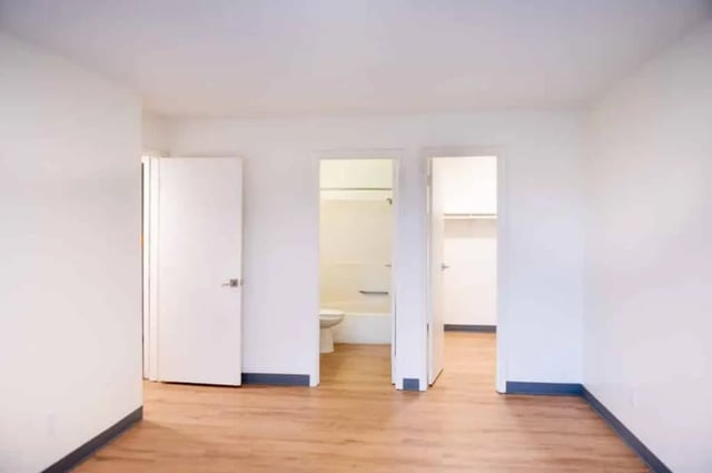 Doors opening to bathroom and closet interior at Silvertree Communities in Muncie Student Accommodation