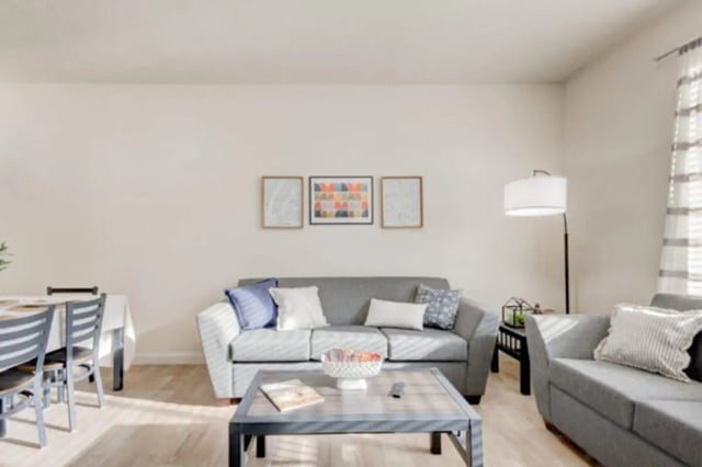 Sofa coffee table dining set living room at The Gates in Rexburg Student Accommodation