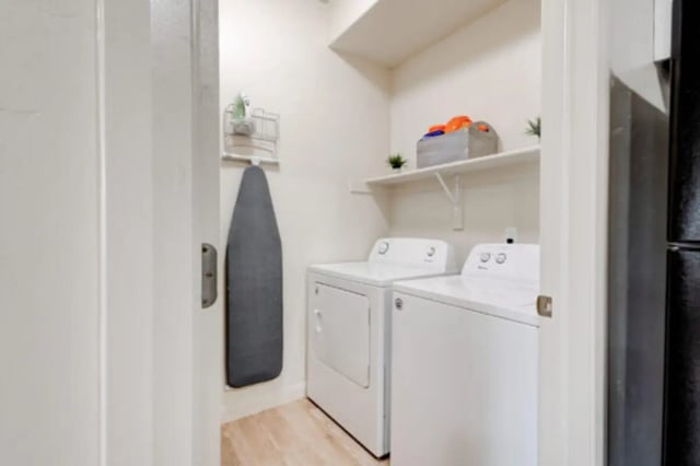 Ironing board, washer, dryer, laundry room at The Gates in Rexburg Student Accommodation