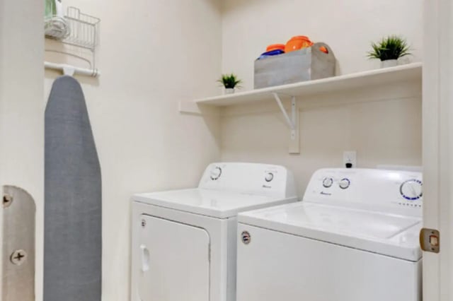 Ironing board washer dryer laundry basket shelf Laundry Room at The Gates in Rexburg Student Accommodation